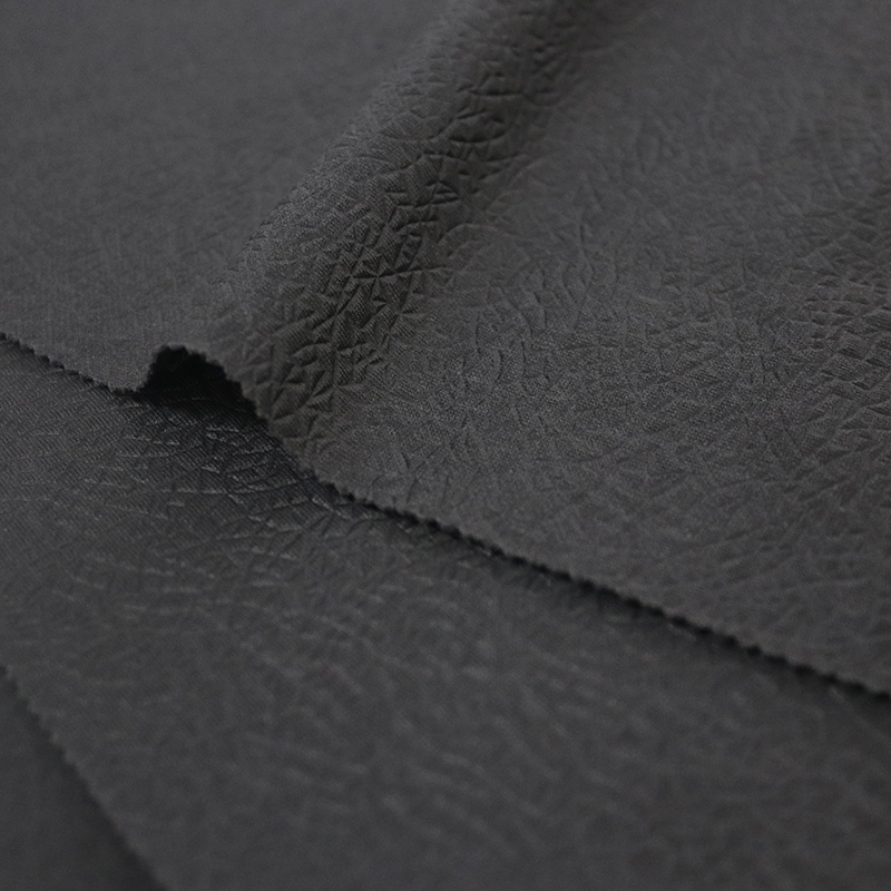 100% POLYESTER DOUBLE P.K. EMBOSSED WITH FLAME RETARDANT