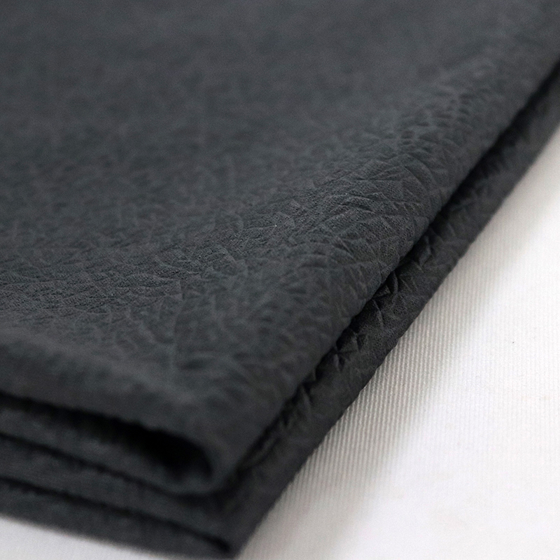 100% POLYESTER DOUBLE P.K. EMBOSSED WITH FLAME RETARDANT